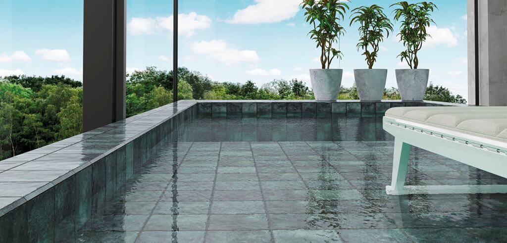 UNA PISCINA DIFERENTE CON PORCELANATOS PORTINARI. | Vedek Revestimientos