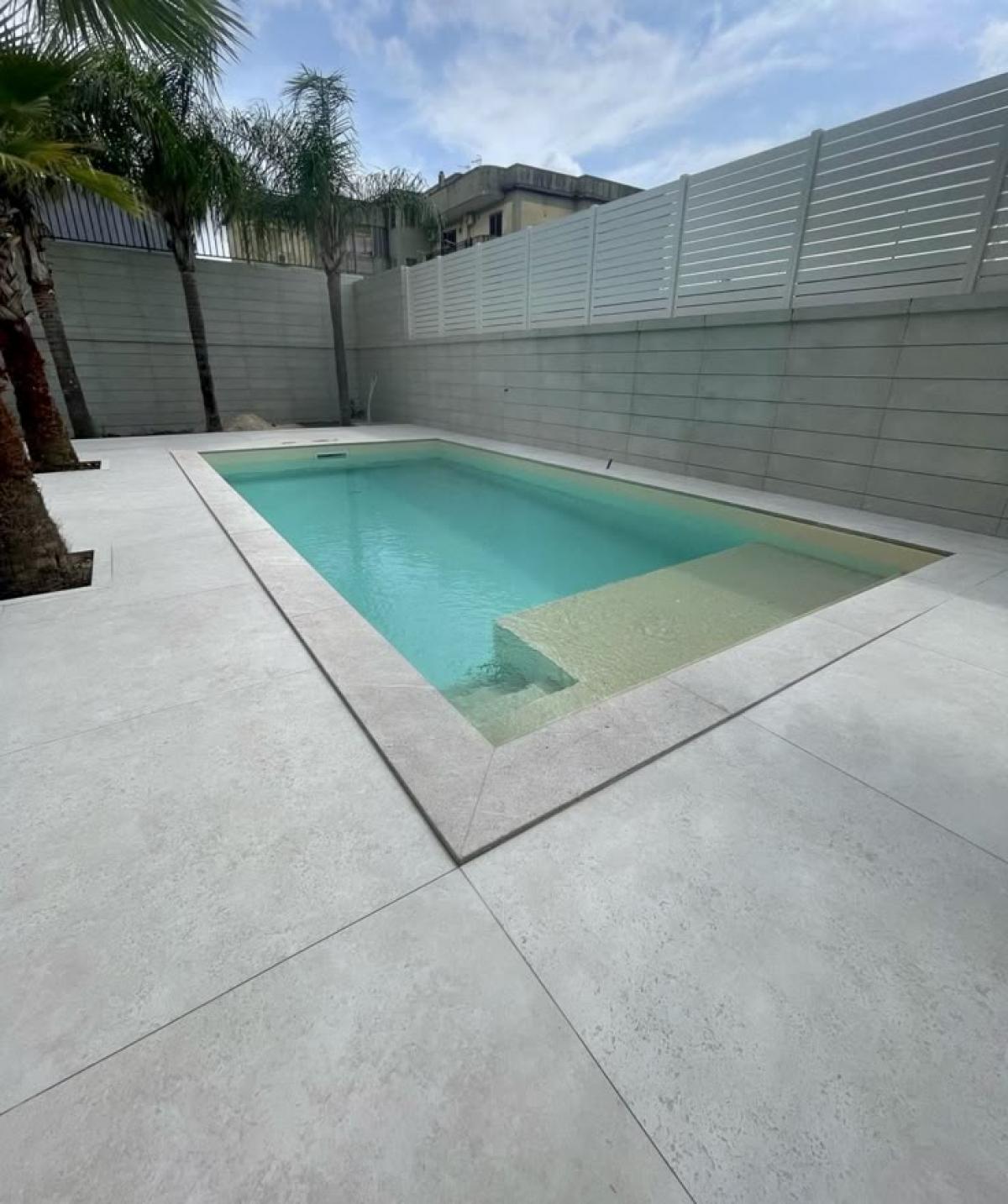 AquaQuartz Arena - Revestimiento Cementicio | Vedek Revestimientos